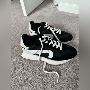 Black and white Steve Madden platform sneakers